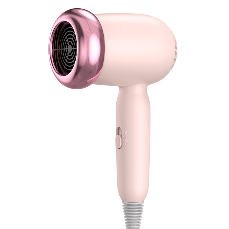 Pink compact hair dryer with rounded front housing