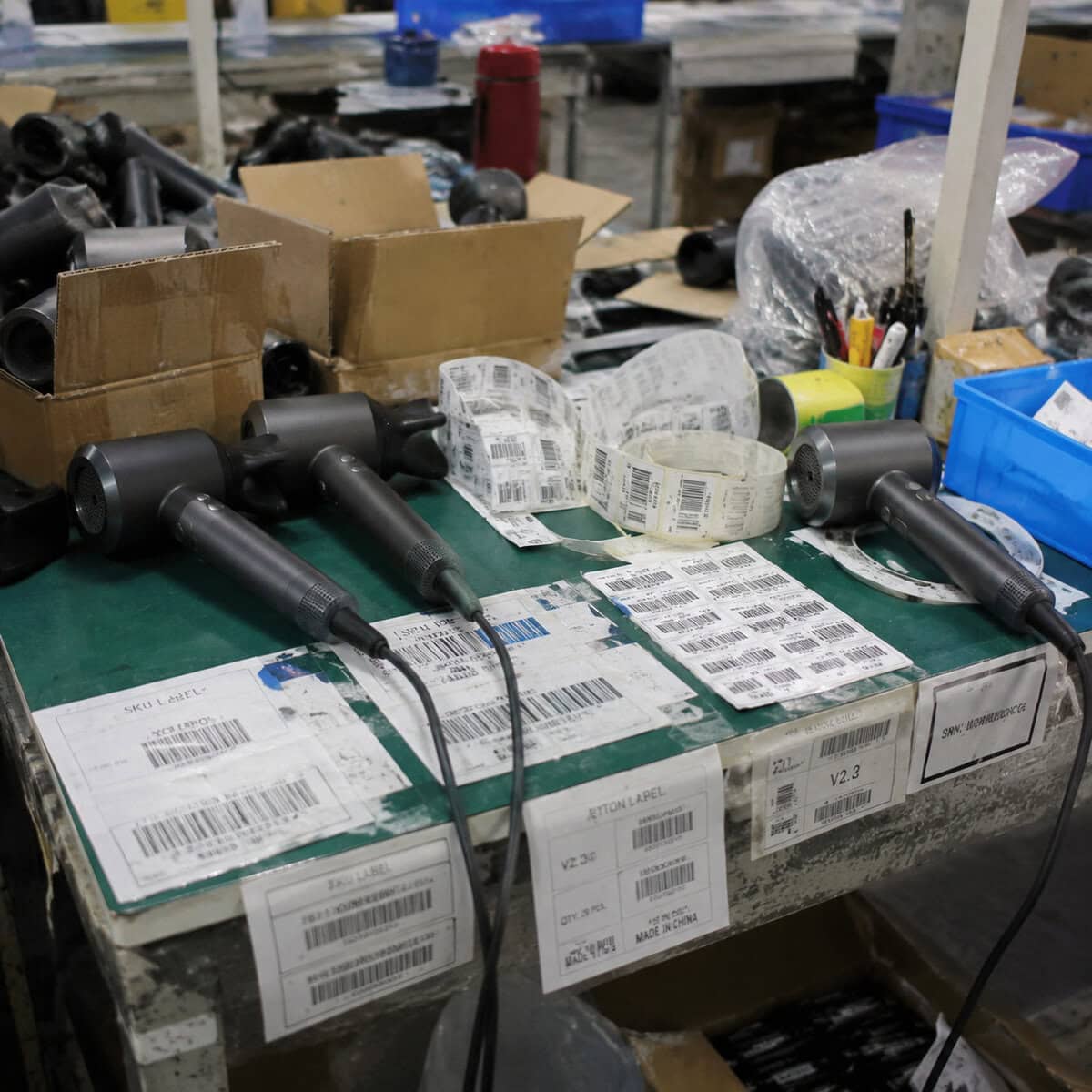 Hair dryer cartons and packaging materials in a factory