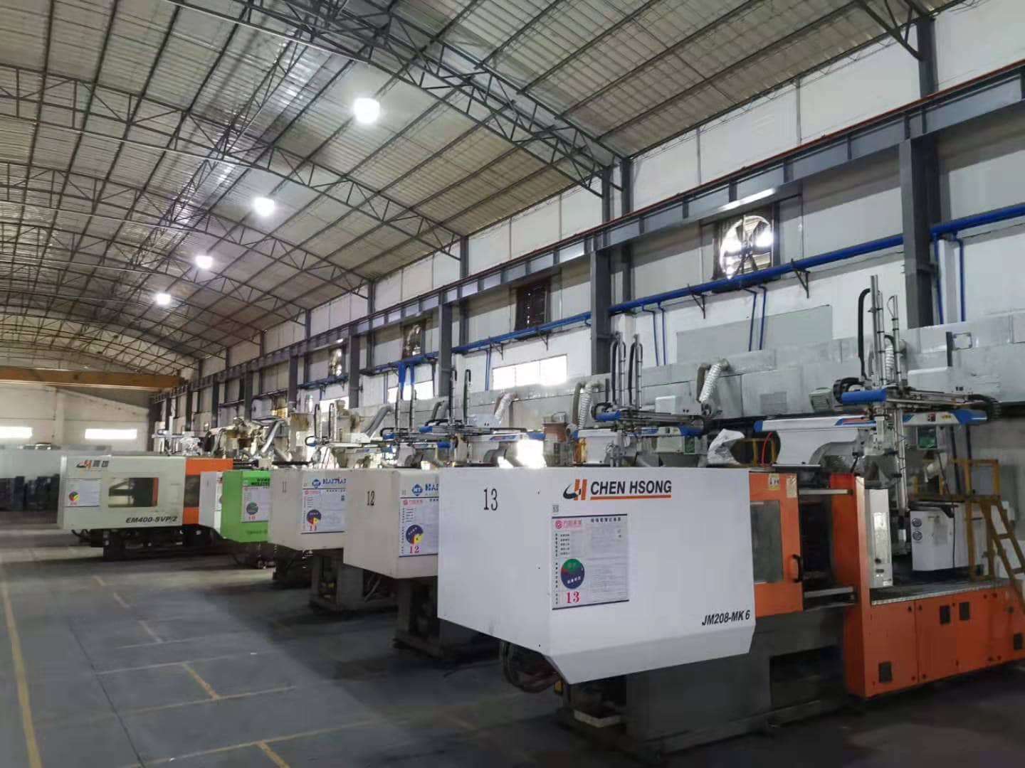 Injection molding machines in a hair dryer factory