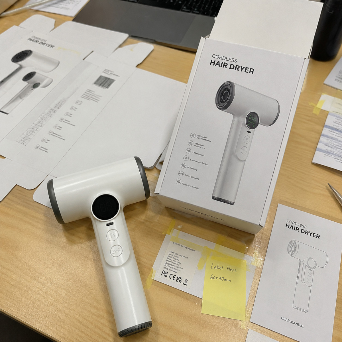 Cordless hair dryer with packaging and specification notes